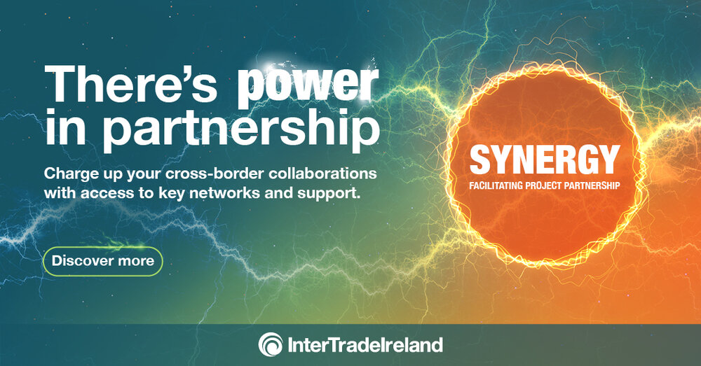Graphic for the InterTradeIreland Synergy programme. Showing text within a fireball circle displaying: SYNERGY facilitating project partnership. Surrounding text displays There's power in partnership, Charge up your cross-border collaboration with access to key networks and support.